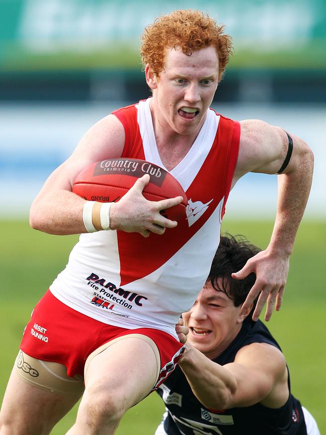 Josh Green in action for Clarence before he was drafted to the AFL.