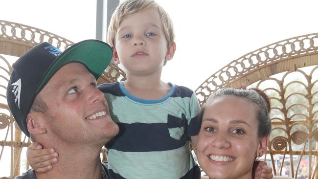 Semi Final of the Quiksilver Pro Surfing contest at Snapper Rocks on the Gold Coast and Stuart Kennedy fails to make the final. Stuart Kennedy and his son Taj 2 and wife Ashlee Kennedy. Picture Glenn Hampson