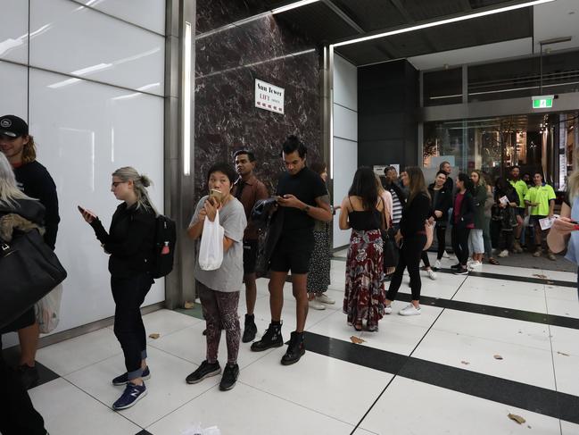 Interstate voters lining up at the Sun Towers in Sydney’s CBD. Picture: Brianne Makin