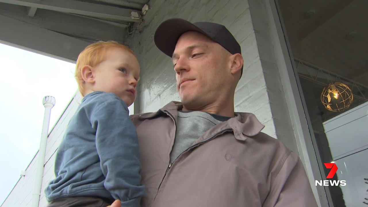 Baby Arli reunited with his dad. Picture: 7NEWS