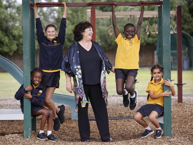 Federal funding data shows private schools are doing well. Mary Abbott, Principal of St James The Apostle Catholic Primary School in Hoppers Crossing, with Mackayla, 9, Ariana, 12, Dimdel, 11 and Sanvi, 7, Picture: Alex Coppel.