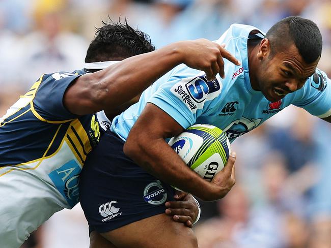 Waratahs Kurtley Beale makes a break during the NSW Waratahs v ACT Brumbies Super Rugby game at Allianz Stadium, Sydney. Pic Brett Costello