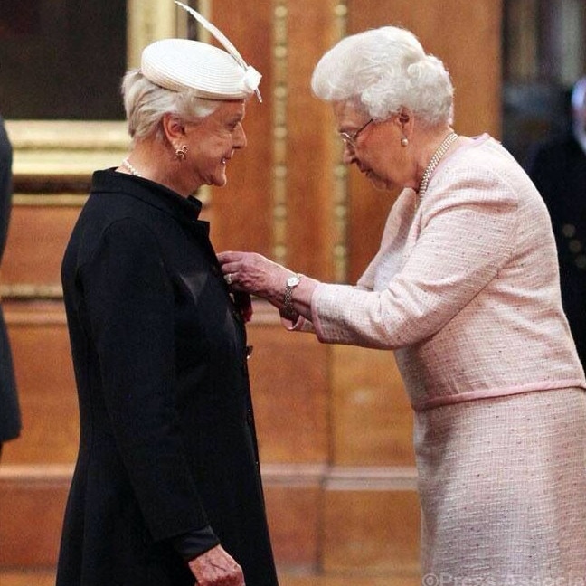 Actress Angela Lansbury awarded Dame Commander (DBE) by Queen Elizabeth II at an Investiture ceremony at Windsor Castle on April 15, 2014 in Berkshire, England.