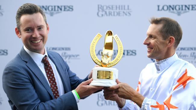 Co-trainer Adrian Bott and jockey Hugh Bowman finally got their hands on a Golden Slipper. Picture: AAP