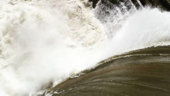 The ferocity of water overflowing from the Hinze Dam. Photo: Sara Hughes