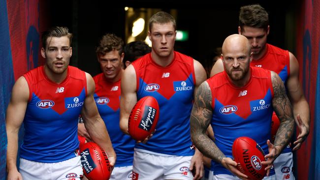 Jack Viney (left) with Tom McDonald (middle) and Nathan Jones. Pic: Getty Images