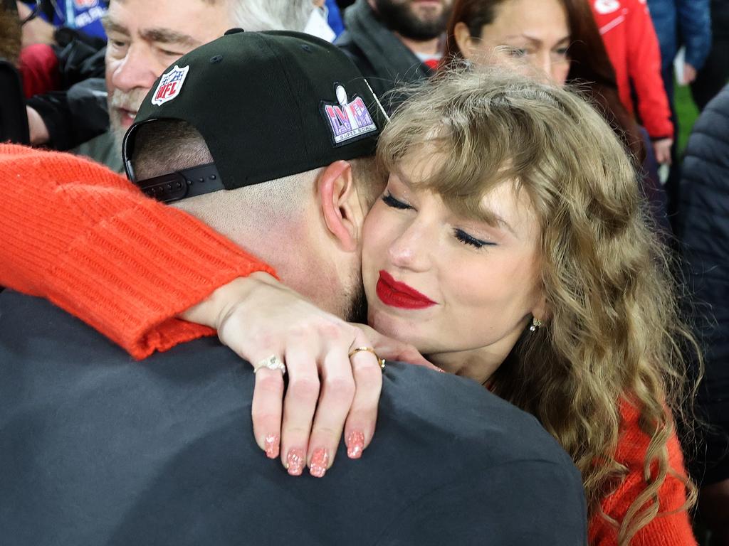 Swift hugs Travis Kelce after the Kansas City Chiefs snare a spot in the Super Bowl. Picture: Getty Images