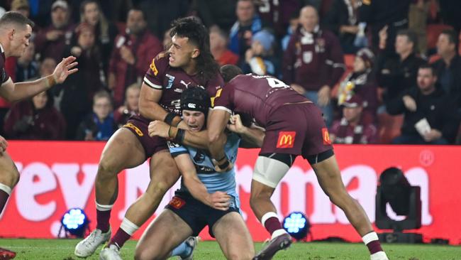 Matt Burton was roughed up by the Maroons last year with the Blues showing very little energy to defend him. Picture NRL Photos