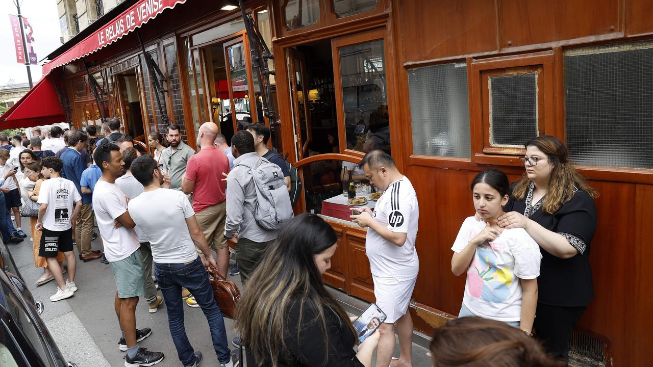 Every night, locals and tourists wait in line for a steak frites at Le Relais de Venise L’Entrecote. Picture: Michael Klein