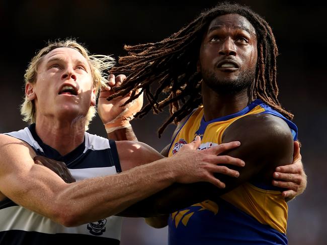 PERTH, AUSTRALIA - APRIL 08: Mark Blicavs of the Cats clashes with Nic Naitanui of the Eagles during the round three AFL match between the West Coast Eagles and the Geelong Cats at Optus Stadium on April 8, 2018 in Perth, Australia. (Photo by James Elsby/Getty Images)