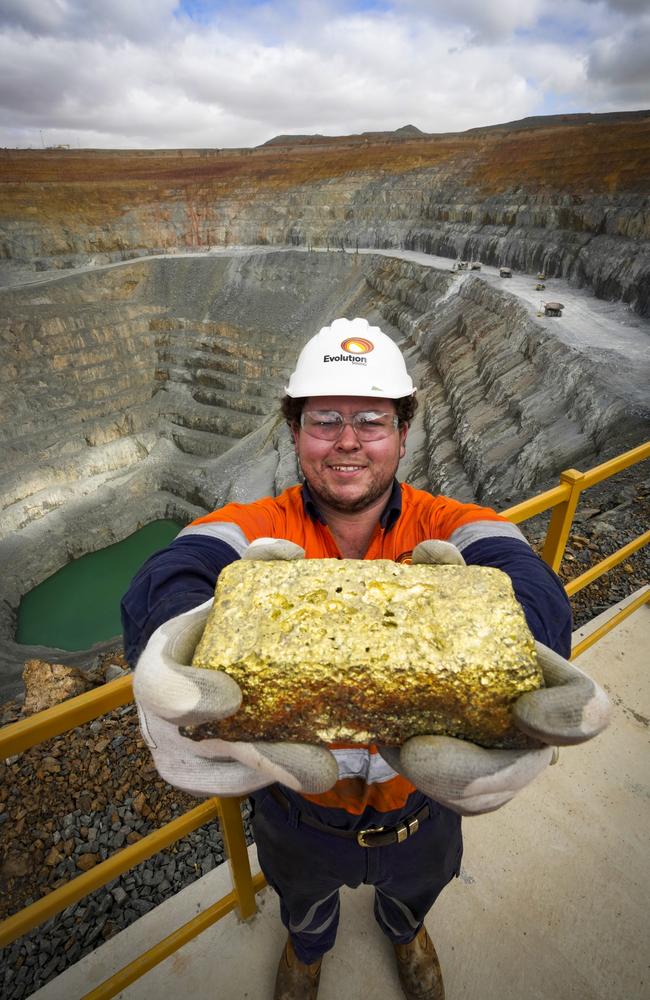 Apprentice fitter at Evolution Mining gold mine at Lake Cowal, near West Wyalong, NSW holds gold nugget.