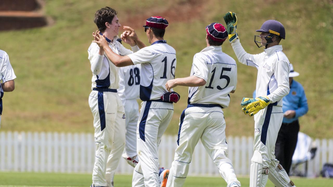 Liam O'Connor (left) of The Southport School (TSS) after getting Toowoomba Grammar School (TGS) batsman Callum Galvi. Picture: Kevin Farmer