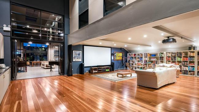 The auction of Jimmy and Jane Barnes’ Botany warehouse has been postponed.