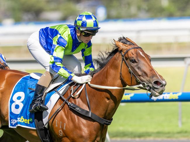 Prairie Flower, ridden by Kayla Crowther, surges to victory in the Listed Durbridge Stakes at Morphettville.