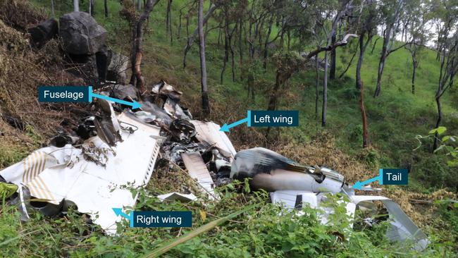 Police found the wreckage of the Piper Cherokee crashed halfway up Mount Hector Range. Picture: Queensland Police Service