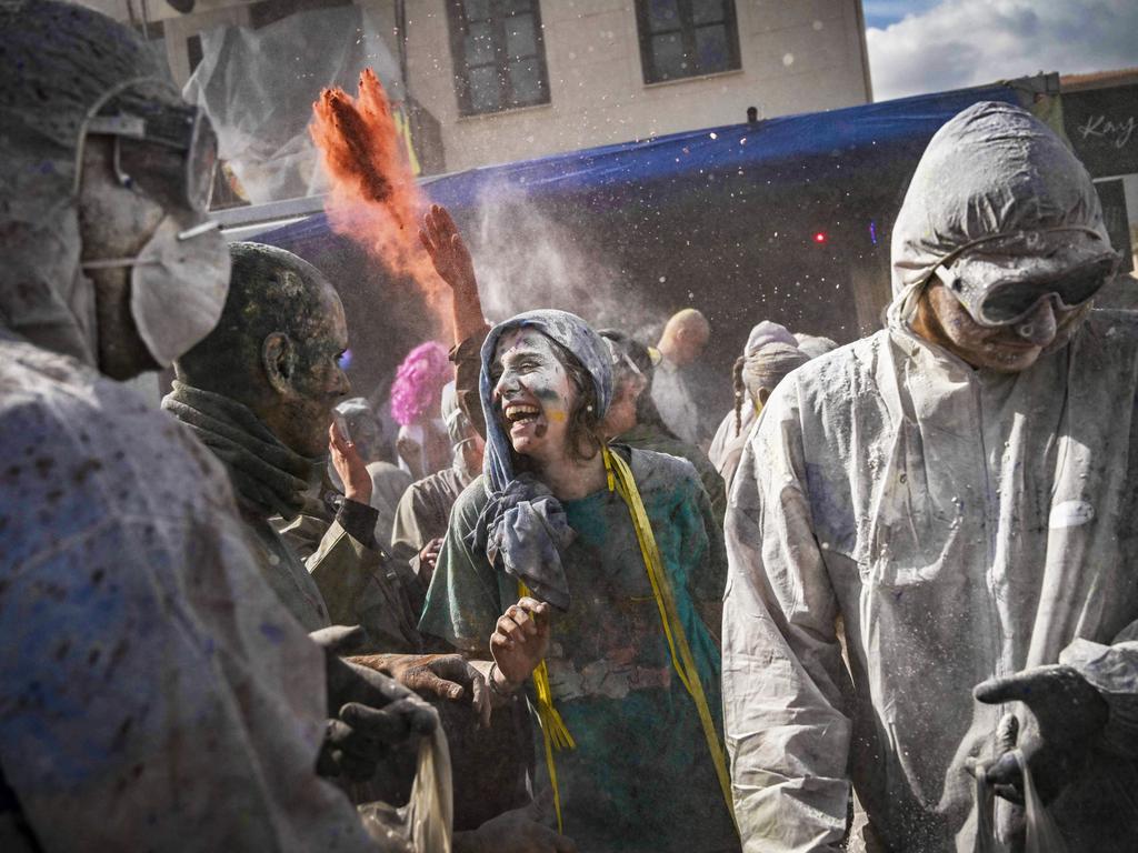 Revellers take part in the traditional 'Flour War' marking 'Clean Monday' and the start of Lent in central Greece. Picture: Aris Messinis/AFP