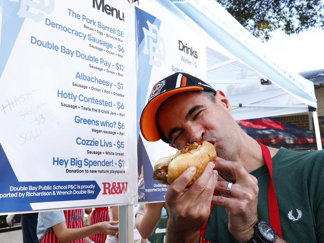 Andrew Linn who is helping out at the sausage sizzle at Double Bay Public School on Election Day. Picture: Jonathan Ng