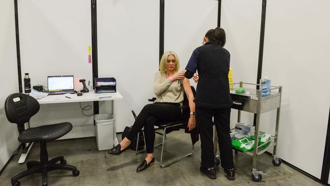 Health worker Cassandra Vakulin gets a Pfizer jab at the Wayville Covid-19 vaccination clinic. Picture: Brenton Edwards