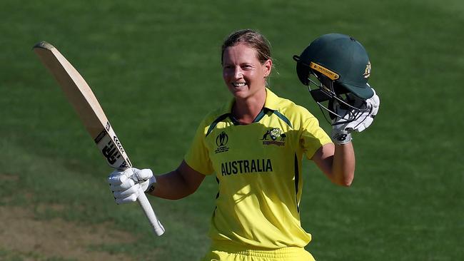 Australia's captain Meg Lanning celebrates after reaching her century (100 runs) during the Women's Cricket World Cup match between Australia and South Africa at the Basin Reserve in Wellington on March 22, 2022. (Photo by Marty MELVILLE / AFP)