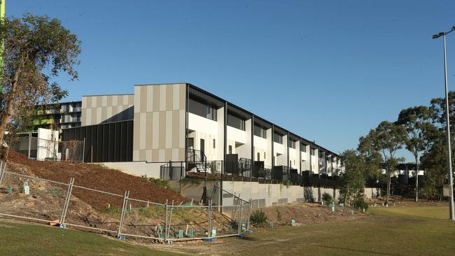 The 82 townhouses at the Commonwealth Games athletes village on the Gold Coast were largely completed aside from some landscaping when Ware Building Pty Ltd was liquidated. Picture Mike Batterham