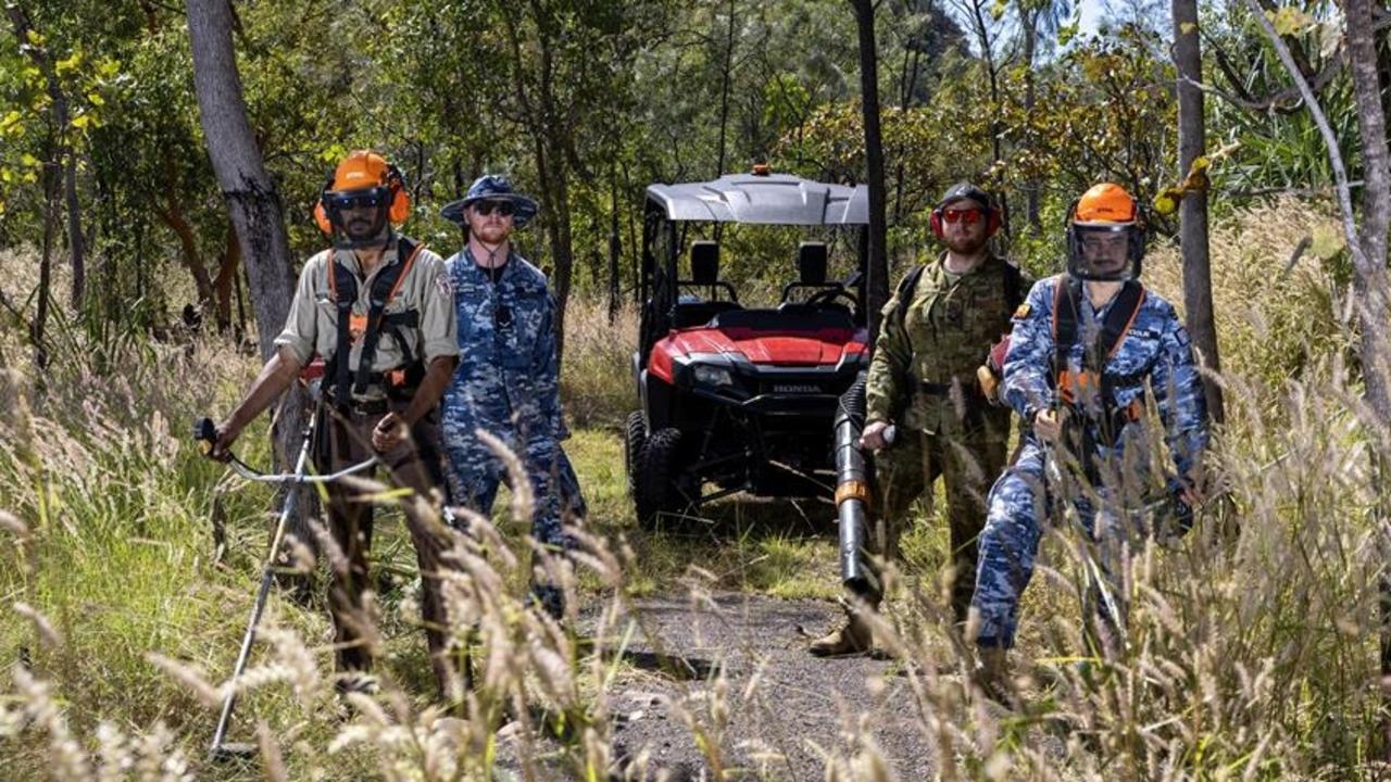 Aviators from RAAF Base Tindal and Northern Territory Parks and Wildlife rangers clear the Jatbula Trail, Northern Territory. Picture: LACW Mikaela Fernlund / Supplied