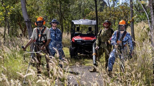 Aviators from RAAF Base Tindal and Northern Territory Parks and Wildlife rangers clear the Jatbula Trail, Northern Territory. Picture: LACW Mikaela Fernlund / Supplied