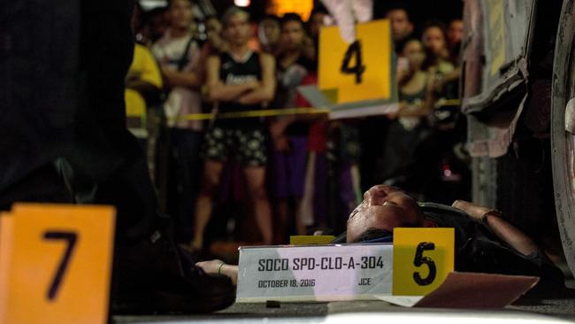 An alleged drug dealer was gunned down by unidentified men in Manila. Picture: APF / Noel Celis.