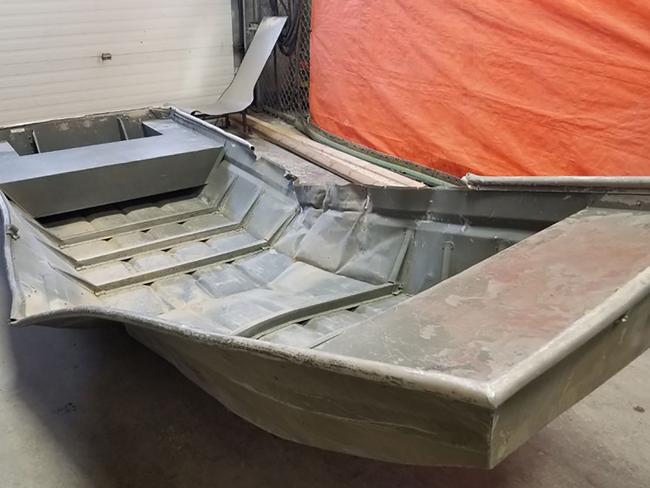 The damaged aluminium boat found by Canadian police. Picture: AFP