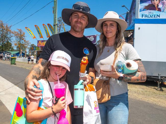 Dave, Shoel and Lakey Surtees enjoying the sun food at the 2023 Lismore Show.