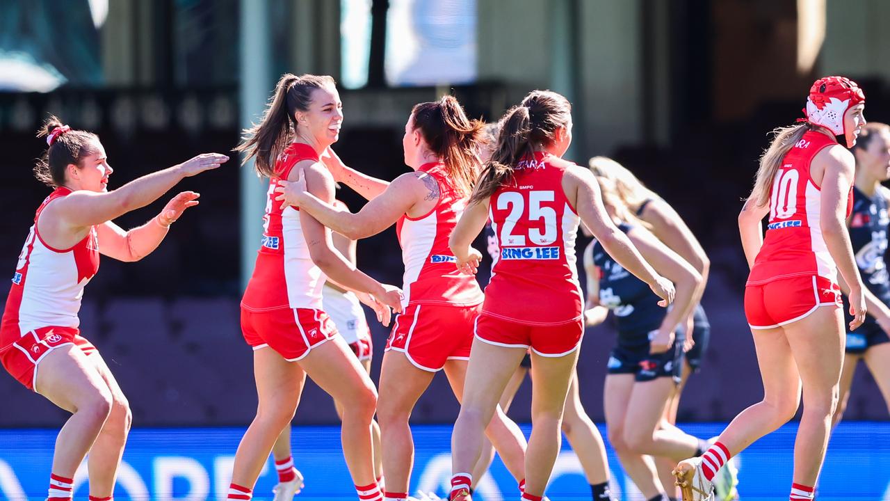 SYDNEY, AUSTRALIA - AUGUST 19: Swans celebrate the goal of Chloe Molloy during the AFLW Practice Match between Sydney Swans and Carlton Blues at at Sydney Cricket Ground on August 19, 2023 in Sydney, Australia. (Photo by Jenny Evans/Getty Images)