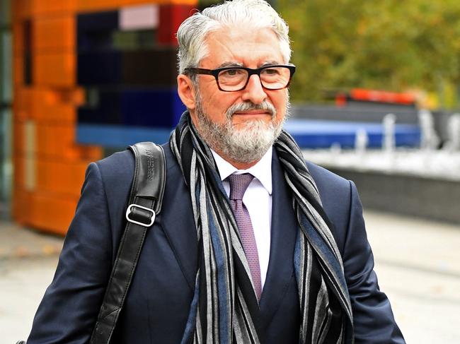 Phil Khoury leaves the Commonwealth Law Courts in Melbourne, Monday, May 21, 2018. Khoury was giving evidence at the Royal Commission into Misconduct in the Banking, Superannuation and Financial Services Industry.  (AAP Image/Julian Smith) NO ARCHIVING