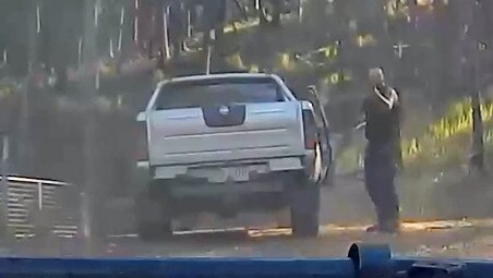 Ricky Maddison aims his weapon at Senior Constable Brett Forte’s car. Picture: Supplied