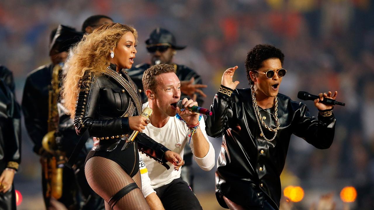 2016: Beyonce, Chris Martin of Coldplay and Bruno Mars perform during the Pepsi Super Bowl 50 Halftime Show. Picture: Ezra Shaw/Getty Images