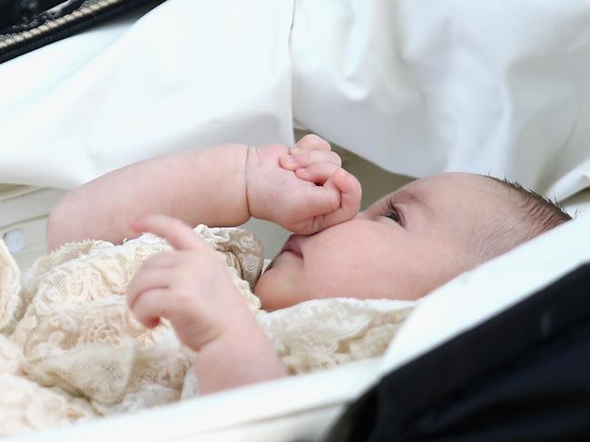 Princess Charlotte of Cambridge is pushed in her silver cross pram as she leavesthe Church of St Mary Magdalene on the Sandringham Estate for the Christening of Princess Charlotte of Cambridge on July 5, 2015 in King’s Lynn, England. Picture: Getty