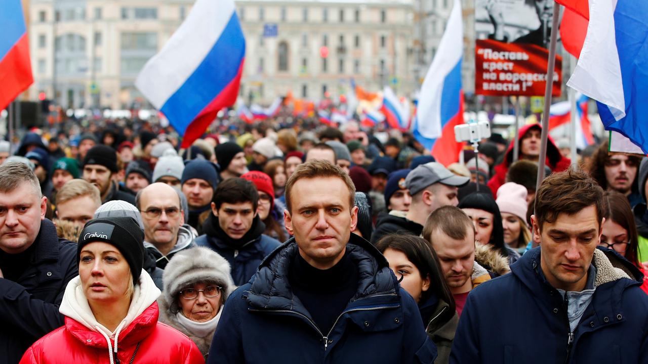 Russian opposition leader Alexei Navalny, his wife Yulia and brother Oleg take part in a march at Strastnoy Boulevard in protest of Russian politician and opposition leader Boris Nemtsov, who was shot dead in 2015. This picture is from 2019. Picture: Sefa Karacan/Anadolu Agency/Getty Images