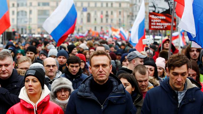 Russian opposition leader Alexei Navalny, his wife Yulia and brother Oleg take part in a march at Strastnoy Boulevard in protest of Russian politician and opposition leader Boris Nemtsov, who was shot dead in 2015. This picture is from 2019. Picture: Sefa Karacan/Anadolu Agency/Getty Images