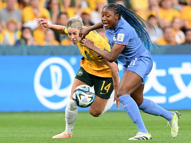 Alanna Kennedy of Australia and Kadidiatou Diani of France compete for the ball during the Women's World Cup. Picture: Bradley Kanaris/Getty Images