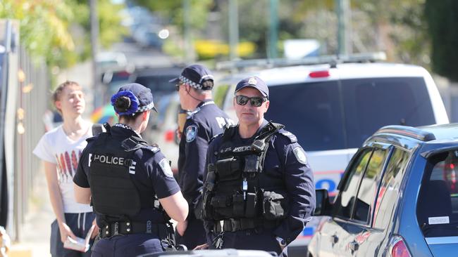 Protesters at a Kangaroo Point motel continuing under police guard. Picture: Peter Wallis