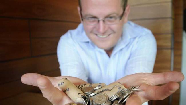 Brad Fitzgibbon with 5 cent pieces. Photo: Bev Lacey/The Chronicle. Picture: Bev Lacey