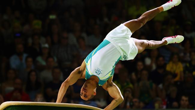 SA gymnast Chris Remkes on his way to winning vault gold at the Gold Coast Commonwealth Games. Picture: Dean Mouhtaropoulos/Getty Images