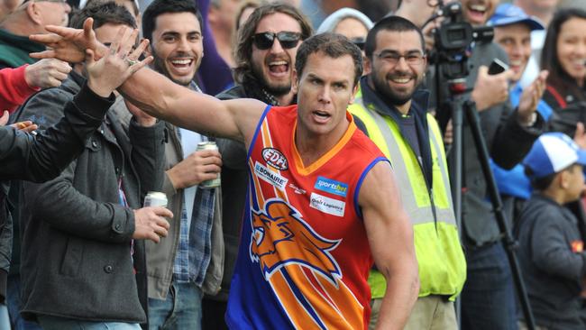 Wayne Carey celebrates booting a goal in his brief appearance for Maribyrnong Park.