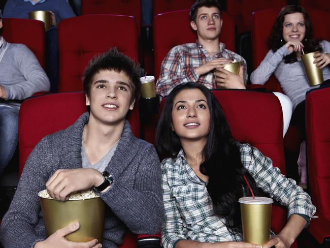 iStock. Cinema patrons watching a movie. generic. For Bill Rule. Budget Busters.