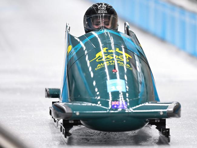 Australia's Breeana Walker takes part in a women's monobob bobsleigh training session at the Yanqing National Sliding Centre during the Beijing 2022 Winter Olympic Games in Yanqing on February 10, 2022. (Photo by Daniel MIHAILESCU / AFP)