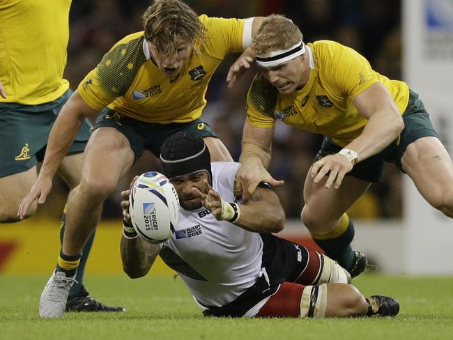 David Pocock and Michael Hooper work in tandem to stop Fiji.