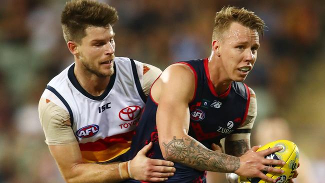 Bryce Gibbs keeps James Harmes on a tight leash. Picture: Scott Barbour/Getty Images