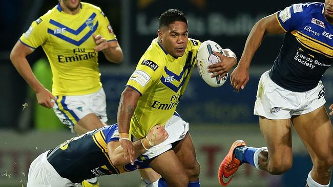 Chris Sandow of Warrington Wolves is tackled.