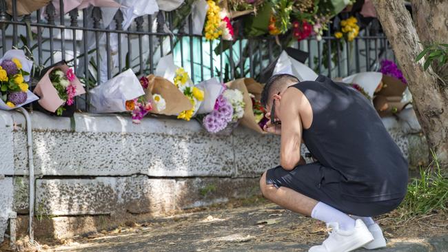 A man pays his respects at the former home of Jesse Baird in Paddington. Picture: NCA NewsWire / Monique Harmer