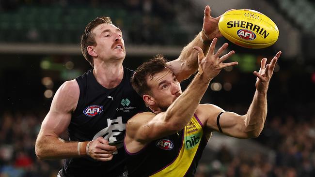 Former Kangaroo Sam Durdin spoils Noah Balta during his first game for Carlton. Picture: Michael Klein