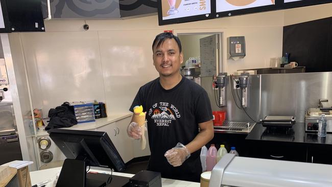 Asim Gautam manning the fort at Cup and Cone before the lunch rush begins. Picture: Isaac Selby