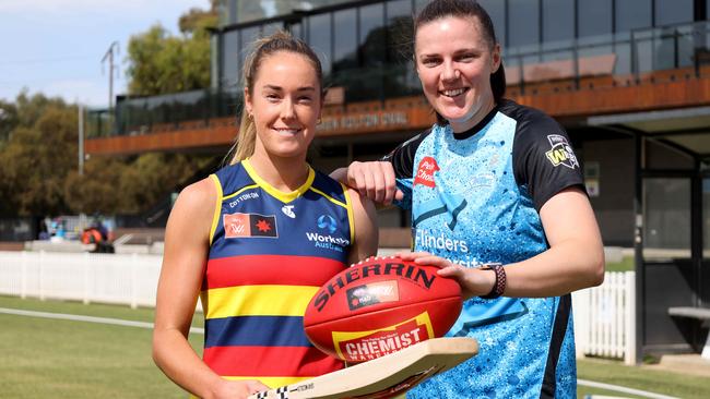 Crows AFLW player Maddi Newman and Strikers captain Tahlia McGrath getting ready for the Double header next weekend at Karen Rolton Oval. Picture: NCA NewsWire / Kelly Barnes